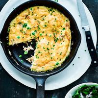 Smoked trout and pea frittata with parsley and red onion salad  Ready in under 30 minutes, this smoked trout frittata is quick and easy to make and doesn't require many ingredients