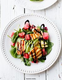 Salad with watermelon, avocado and grilled halloumi cheese