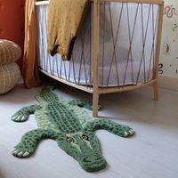 This handmade friendly-faced crocodile rug is the perfect way to brighten up and make a feature of any room.Ethically sourced, and handmade with patience and love for the artisanal craft, this unique rug will quickly bring cheer and happiness to your space.Due to the handcrafted nature of these items, expect slight variations in the appearance of each rug. Perfect by no means, but unique all the more!Each rug from Doing Goods’ Tapis Amis collection is tufted by hand in India, run by a family who