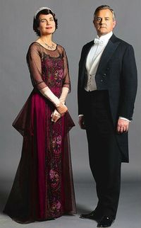 Lady & Lord Grantham, tip-toeing slowly into the '20s.