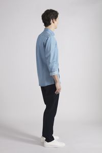 The denim shirt has evolved from its traditional workwear origin into a new classic. Stripped of unnecessary details, our shirt is cut from a densely woven indigo dyed structure, has a soft handle that will only get better with time. Whether you wear it alone, layered or as an overshirt - its a reliable choice.