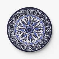 You don't have to come all the way to Spain to get a plate!  This is a photograph of a plate I own, made in Talavera.  For your next paella party.