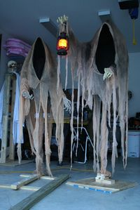 Cloaked Ghosts Halloween yard decoration