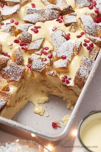 Eggnog bread pudding is the quintessential holiday breakfast and dessert. Warmly spiced with notes of nutmeg, vanilla, and cinnamon, this delicious recipe is tender thanks to a rich eggnog custard. You’ll love it for Thanksgiving and Christmas morning brunch! It’s simple to assemble with just 15 minutes of hands-on prep and requires easy-to-find ingredients that you probably already have on hand. Makes a lot of servings perfect for entertaining and feeding a crowd. | CountryHillCottage.com