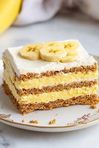 This banana icebox cake is sweet, creamy, and irresistible! The layers of banana pudding, bananas, and graham crackers simply can't be topped.