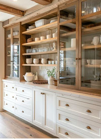 Kitchen Cabinets - Clean Wooden Blends. Oak and Pine Accents. White oak kitchen cabinets are experiencing a surge in popularity, capturing the attention of homeowners and designers alike for their natural elegance and timeless appeal.   Oak Cabinets Home Decor Home Renovations Home DIY Home Ideas Home Design Outdoor Renovations Pinterest Trends DIY Cozy Cabin Aesthetic Brick Fireplace Home Trends Nails Fall Outfits Home Design Mini Home Gym Fall Office Decor Fall Colors Patio Ideas