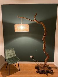 Discover the rustic charm of our one-of-a-kind Rustic Wooden Tree Branch Floor Lamp, featuring a solid wooden base, a branch wrapped in rope, and a gorgeous lampshade. This unique piece adds character and warmth to any space, making it a standout addition to your home decor. Each piece an entirely unique creation, and hand-made to order, tailored especially for you! Choose your height (standard approx 2 metres height) Lampshade approx 50-60cm diameter On a solid wooden base Elevate your living s