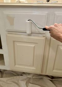 Does your bathroom need a makeover, but remodeling is not in the budget? Learn How To Paint Your Bathroom Vanity (In 5 Easy Steps) by thetarnishedjewelblog.com. #paintingbathroom #paintingbathrooms #paintingbathroomcabinets #bathroommakeover #bathroomrefresh #girlsbathroom