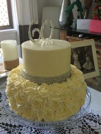 Made this for my in-laws 60th wedding anniversary. Coconut layer cake with meringue butter cream icing.