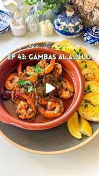 Rafia Mazhar | Easy Recipes | Home Chef on Instagram: "Gambas Al Ajillo Recipe ⤵️

Make it at Home Episode 43: Cafe Loco Gambas Al Ajillo 🦐

Ingredients 
10 large prawns with tail (cleaned)
1/4 cup + 2 tbsp extra virgin olive oil 
3 button chillies
3 large cloves garlic thinly sliced 
1/2 tsp salt
1/4 tsp hot paprika (or use regular)
1/2 tsp regular paprika
1/2 tsp chilli flakes 
Juice of 1/2 lemon
3 tbsp chopped parsley 
Crusty bread for serving

* in a pan add the olive oil, button chillies and garlic. Keep the flame LOW otherwise the garlic will burn 
* Add all the spices and mix well
* Now add in the prawns and cook for only one minute per side
* Squeeze the lemon juice on top and all the parsley 
* Serve immediately with some crusty bread for dipping 

HAVE A QUESTION?
📝 Leave a com