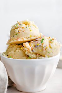 This delicious Edible Sugar Cookie Dough is safe to eat and oh-so delicious! Perfect for a quick treat or snack! This easy comfort food is fun for the whole family and is made with heat treated flour and no eggs so everyone can dig in and enjoy! // Mom On Timeout