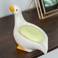 Ceramic Little Yellow Duckss Soap Box Cute Duckss Shaped Soap Box Toilet Storage Rack Decoration Soap Features: Excellent ceramic material: Our adorable ducks-shaped soap is made of excellent ceramic, ensuring durability and long-lasting use. The surface and delicate craftsmanship add a of elegance to your bathroom decor. Cute and practical design: Designed in the shape of a small yellow ducks, our soap dish is not a functional item for storing and draining soap but also a cute decoration for yo