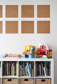 Corkboard tiles are a cheap (less than a buck each!) and fun way to display your child's artwork. (Check out the post to see how to hang them perfectly straight the first time)