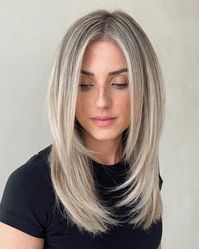 Medium-to-Long Haircut with Layers around the Face