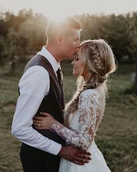 Wedding Photography - timeless pose at golden hour for newly married couple