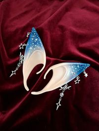 These handmade blue celestial star elf ears are the perfect cherry on top for any cosplay, renfaire, dnd, or larp outfit! package includes 1 pair of elf ears ears elf ear care: - DO NOT forcefully bend your elf ears, they are made to be slipped onto the ear - don't store your ears on any jagged surfaces as this may scratch the paint - don't leave your ears sitting in extreme temperatures