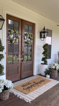 Spring front porch front door home decor and accents wreaths lantern wall sconce lighting light fixtures spiral boxwood faux artificial topiaries large oversized white planters basket planters faux geraniums white hydrangeas double layered welcome doormat and jute scatter rug hello sunshine Etsy nearly natural pottery barn target overstock Amazon   Follow my shop @brunoandlibby on the @shop.LTK app to shop this post and get my exclusive app-only content!  #liketkit #LTKFind #LTKSeasonal #LTKhome  • @shop.ltk  • https://liketk.it/43IxO