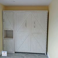 Mission Shaker Barn Door Vertical Murphy Wall Bed with Flat Trim (shaker cut) Shown in Whitewash on Oak. The Bar Handles and Hidden Flip Down Leg Replace the 2 Standard Block Legs.
Shaker Nightstand Pier with Flat Trim, Barn Door Style on Bottom, Open Mid-Section and Barn Door Style on Top with 3 Adjustable Shelves.