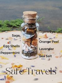 A blend of intentional herbs and crystals creates this safe travels spell jar