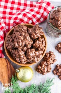 Easy Crockpot Candy Crack is perfect for Christmas gift giving and entertaining! Inspired by Trisha Yearwood recipe, these peanut clusters are so simple to make! Substitute white chocolate, pecans, caramel, and more to make this recipe your own! #crockpot #slowcooker #candy #chocolate #easyrecipes