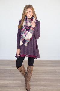 I'm loving the texture of the tunic hem, and the combo with the patterned scarf.