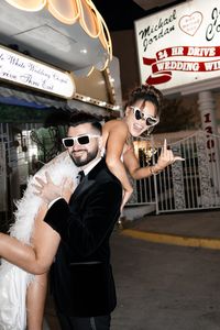 Bride and groom flash portraits after their elopement at The Little White Chapel in Las Vegas. Get inspired by more Little White Chapel Vegas aesthetic, Little White Chapel wedding inspiration, and Little White Chapel photoshoot ideas!