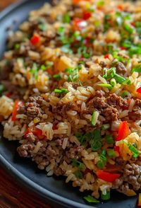 This Dirty Rice with Ground Beef recipe is easy to prepare and packed with savory flavors from the seasoned ground beef and aromatic vegetables