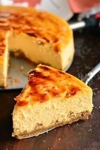 Creme Brulee Pumpkin Cheesecake. This smooth, silky pumpkin cheesecake is made with the ginger snap cookie crust, extra cookies on the bottom, heavenly pumpkin cheesecake and crunchy, caramelized sugar on top.