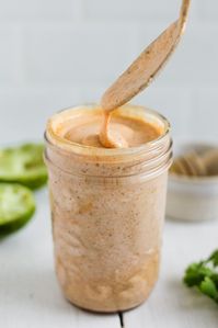 This Southwest Salad Dressing recipe made with Greek yogurt, olive oil, lime, honey, and spices is a smoky, creamy, and healthy dressing!