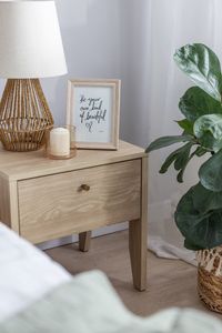 Are you looking for a stylish and practical bedside table to keep your devices charged and ready for the next day? Look no further than the Thijmen with USB Charging Port - Oiled Oak. This modern and minimalist bedside table features a spacious drawer for storing your essentials, a smooth top surface for placing your lamp, books, or alarm clock, and a built-in USB and USB-C charging port for conveniently powering your phone, tablet, or laptop. The oiled oak finish adds a warm and natural touch t