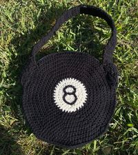 all signs point to support ang3larts!! this is a 16 page, in-depth pattern that includes images and tutorials and written instructions to make your very own magic 8 ball bag 🎱🌟 beginner friendly pattern tested by five crochet artists, original design and art by angela dugan of @ang3larts on Instagram and Tiktok