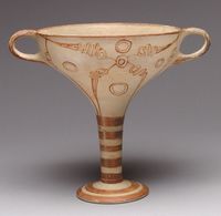 Mycenae: Terracotta kylix, stemmed cup, w/murex decoration, H.8-3/8" late 14th c. BC. The murex, a type of mollusk, was prized throughout antiquity as a source of purple dye. Improved methods of firing made this type of long-stemmed cup possible. The shape became the standard form of drinking cup onward. @Deidra Brocké Wallace. MMA, NYC