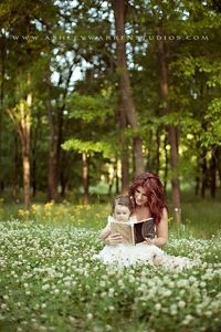 I dont like the tree coming out of her heads, otherwise a great picture, the white color draws attention but pink/yellow would have also added more contrast with white flowers around,love the emotions and posing