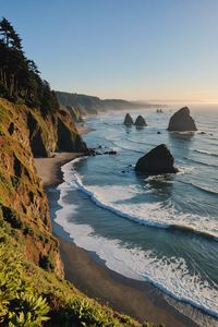 The Oregon Coast is a hidden gem in the Pacific Northwest! 🌊 With its rugged cliffs, pristine beaches, and historic lighthouses, this coastal region is a true wonder to behold. 😍 You can embark on scenic drives, explore vibrant tide pools, and immerse yourself in outdoor adventures like kayaking and hiking to cascading waterfalls. 🛶🌳 Make your trip extra special by discovering unique accommodations, such as enchanting treehouses and breathtaking lookouts that offer panoramic views of the coast. 🌲🏠 Whether you're seeking a peaceful escape or an action-packed adventure, the Oregon Coast has something amazing for every visitor. 🌄 Uncover the natural wonders and cultural richness of this remarkable destination!