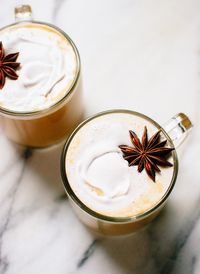 It's fall! Halloween, Thanksgiving and everything PUMPKIN! Creamy pumpkin spice chai lattes made with real ingredients (only 90 calories!) - cookieandkate.com