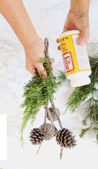 Turn a few pine cones and branches into the most beautiful decorations today! Practically free and so creative, it only takes 3 minutes! #pinecones #pineconecrafts #diy #homedecor #homedecorideas #diyhomedecor #thanksgiving #christmas #christmasdecor #christmascrafts #christmasideas #christmasdecorations #crafts #crafting #winter #farmhouse #vintage #farmhousestyle #farmhousedecor #weddingdecor