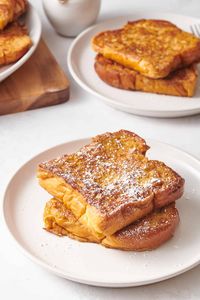 Upgrade your holiday breakfast with this easy festive eggnog French toast recipe soaked in sweet eggnog and spiked with cinnamon and cloves! 