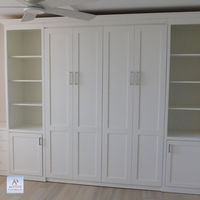 Custom Square Shaker 8 Panel Queen Vertical Murphy Wall Bed with 19” Bifold Doors shown in Solid Pure White on Maple and Flat Trim - 68w x 86 5/8h x 22"d2 2 Custom Shaker Wall Bed Piers with Square Shaker Door on Bottom, Open Above with Adjustable Shelves, Flat Trim - 24w x 86 5/8h x 22"d 4” Thick Headboard with 2 Receptacles, 2 USB Ports shown with Optional Furniture Sockets in Side Piers LED Light Kit inside Bed Cabinets 3" Crown Hat for Wall Bed, 2 Side Piers with Returns on Sides