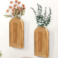 PRICES MAY VARY. ✨【Create a Striking Display with 2 Wooden Wall Planters】Our wall planters for indoor plants have a simple and elegant appearance, with exquisite hand-made carvings, each wall planter will add personality to any space with a perfect balance of modern, minimalistic, bohemian, and farmhouse styles. Perfect for decorating your living room, bedroom, dining room, entryway, office and more, the hanging planter can be used to display your favorite plants or flowers, or just as a stand-alone piece of art. ✨【Perfect for Any Plant Decor Lover】Our wall decor are the perfect combination of modern and farmhouse styles, providing a unique and creative way to display your plants, making the perfect touch of chic to your home décor. You can slip faux flowers or plants in the pocket of wood