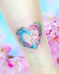 awesome watercolor tattoo for mothers © tattoo artist Adrian Bascur