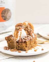 Pumpkin Chocolate Fudge Swirl bars make the perfect seasonal treat! These creamy bars with a Chocolate Sea Salt Probiotic Granola crust are just the right amount of pumpkin spice.