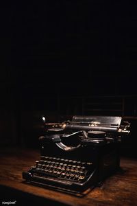 Old typewriter on a wooden table | premium image by rawpixel.com / Jack Anstey