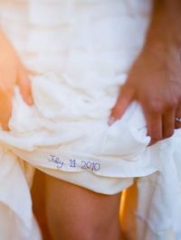 sew your wedding date into the hem of your dress with blue thread -- something blue ideas..done!