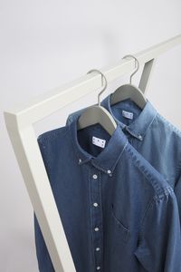 The denim shirt has evolved from its traditional workwear origin into a new classic. Stripped of unnecessary details, our shirt is cut from a densely woven indigo dyed structure, has a soft handle that will only get better with time. Whether you wear it alone, layered or as an overshirt - its a reliable choice.