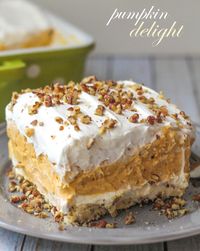 Creamy and Cool Pumpkin Delight with so many delicious layers - everyone will love it! { lilluna.com } #pumpkin