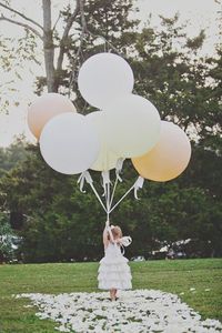 Have flower girl carry balloons instead of flowers!