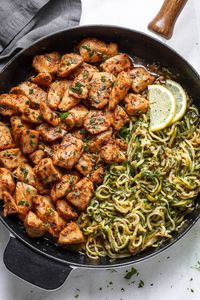 Garlic Butter Chicken Bites with Lemon Zucchini Noodles - They're so juicy, tender, and delicious you'll eat them hot right off the pan! Ready for a new chicken dinner winner?