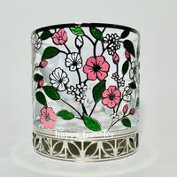 Floral Toss Candle Holder For 3-Wick Candles (Candle Not Included) New With Tags Why You'll Love It: Reminds You Spring Is Right Around The Corner. Measures 4.1" D X 4.3" H Color: Silver-Toned, Pink & White Flowers #5108