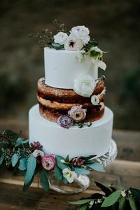 Stunning partially naked wedding cake | Image by Jessie Schultz Photography