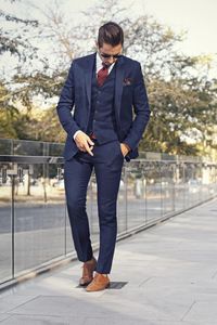 Three piece navy suit with burgundy accents